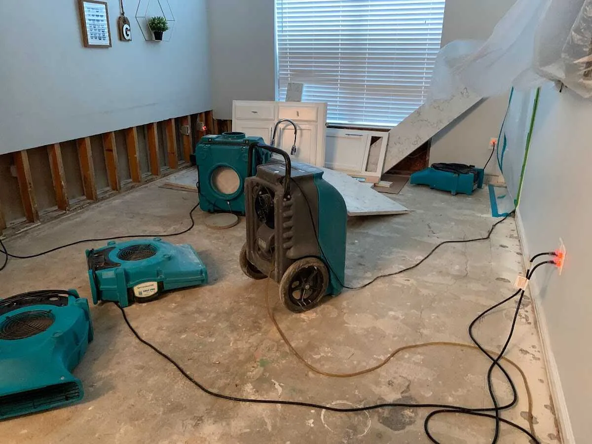 Dehumidifier in flood-cut room for Water Damage Restoration in Marlow Heights